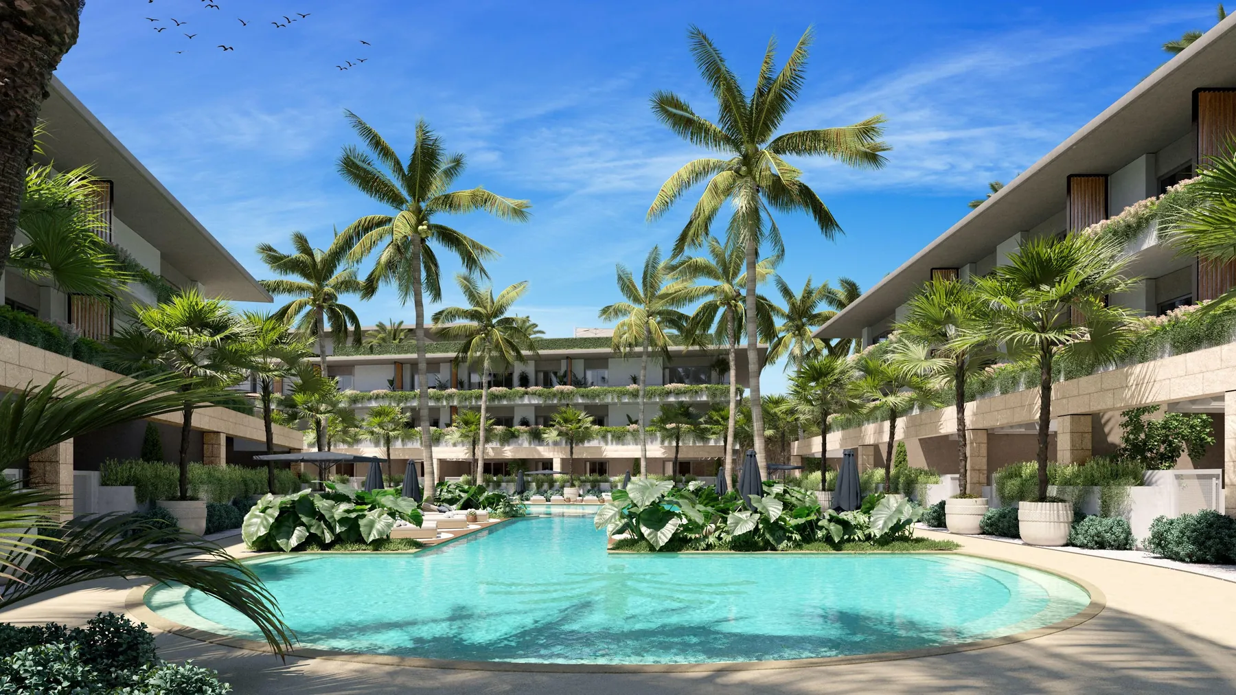 Piscina y palmeras, vista de la fachada